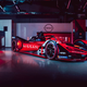 The black and red Nissan E-Dams Formula E Car